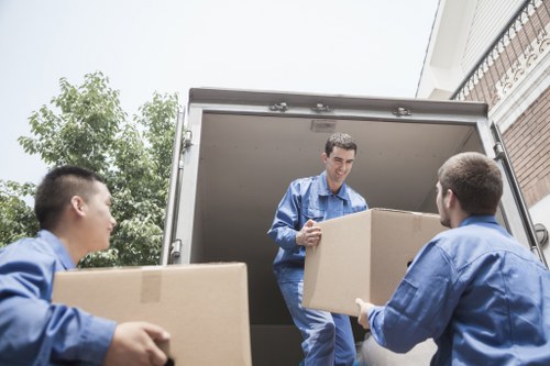 Office removal planning in Fitzrovia with packed boxes and office furniture