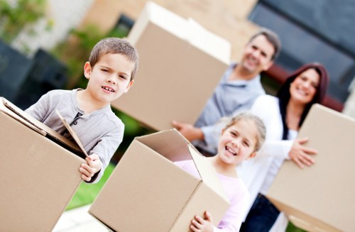 Professional movers handling furniture during Fitzrovia flat removals
