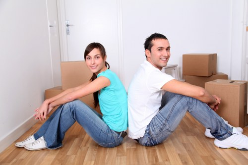 Careful loading of furniture and boxes for a small move in Fitzrovia